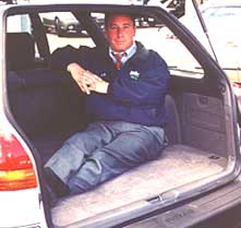 Me sitting in the back of a 98 Legacy Outback. There's a lot of room!