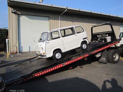 360 minivan on a flatbed car hauler