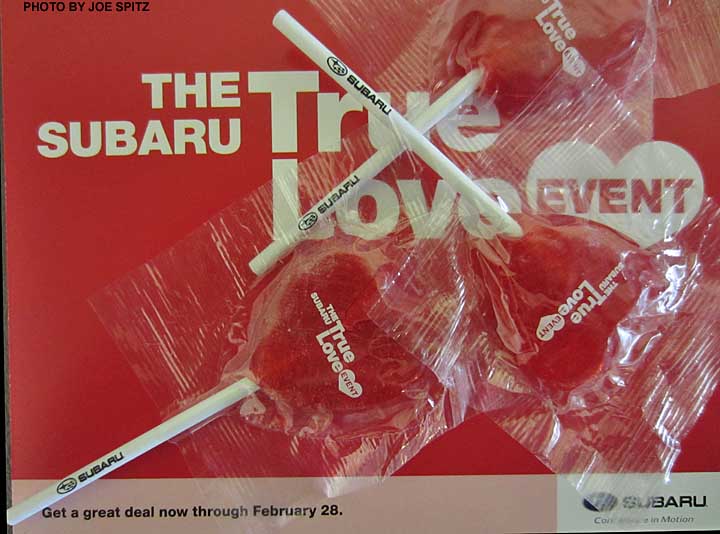 close-up of the red heart shaped lollipops from the 2014 Subaru True Love Event