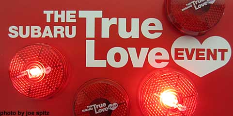 Februaru 2015 Subaru True Love Event with free round flashing True Love belt clip lights, at Subaru dealers while while supplies last