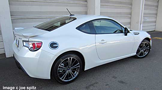 full side view, subaru brz with optional fuel door cover.