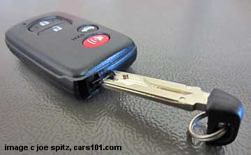 to pen the BRZ Limited keyess access remote, use the tip of the metal key in the slot