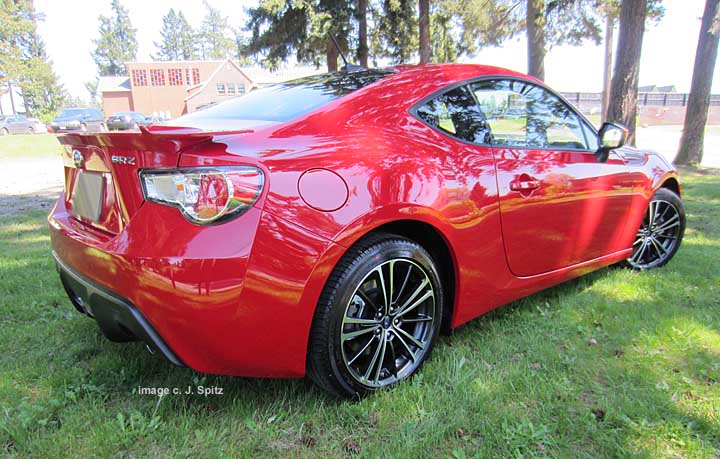 brz- lightning red, with rear spoiler