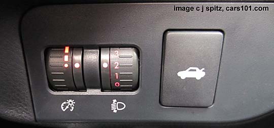 BRZ dash light adjustment dial, headlight aiming, and trunk open buttons are by driver's left knee
