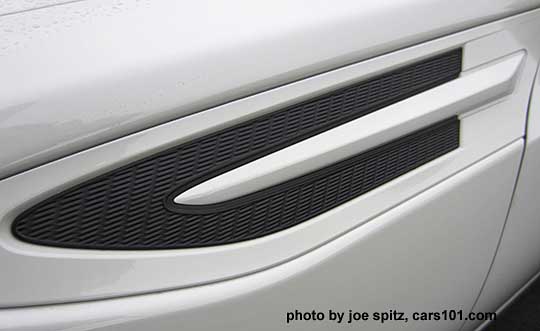 2015 Subaru BRZ with standard body colored fender trim. Shown on a white car