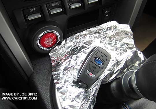 to lock a pushbutton start key inside the key, one solution to disable it is by wrapping in tin foil. be sure to remove the emergency key first so you can get back in the car.