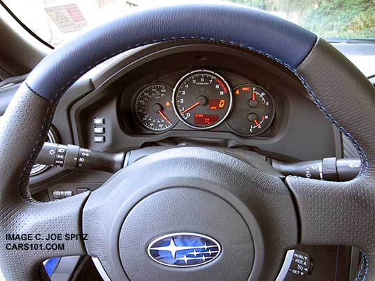 close0up of the 2015 BRZ series.blue steering wheel, blue and black leather wrapped