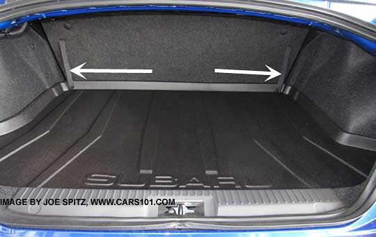 Subaru BRZ rear seats fold flat by pulling the two release straps. Trunk shown with optional trunk liner.