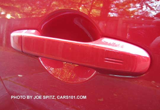 2016 pure red Subaru BRZ Limited door handle with keyless access rub-to-lock hotspot. Passenger side shown.