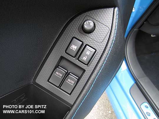 2016 Subaru BRZ driver's door panel power window switches, mirror adjustment . Series.HyperBlue shown with blue stitching