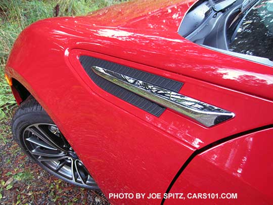 Pure Red 2016 BRZ with optional chrome fender trim. Left side shown