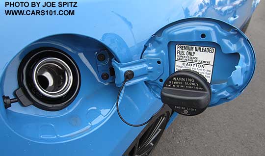 2016 Subaru BRZ gas door, shown open, with gas cap holder. HyperBlue color shown