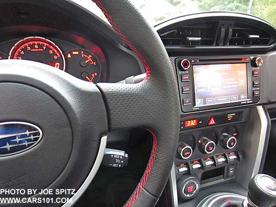 closeup of the 2016 Subaru BRZ Limited leather wrapped steering wheel with red stitching
