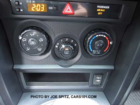 2017 Subaru BRZ Premium manual heater/ac controls with matte gray trim, black console side trim,