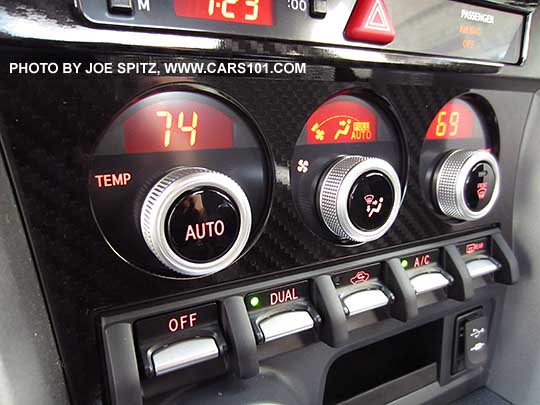 closeup of the 2017 Subaru BRZ Limited dual front zone climate control with digital display and  silver knurled knobs and gloss trim plate