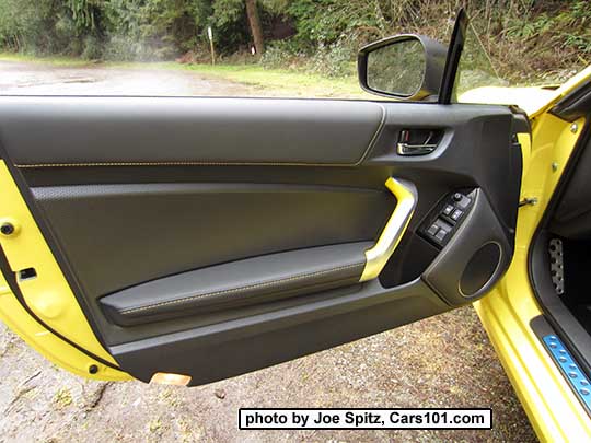 2017 Subaru BRZ Limited Series.Yellow driver's door panel with yellow door grab handle