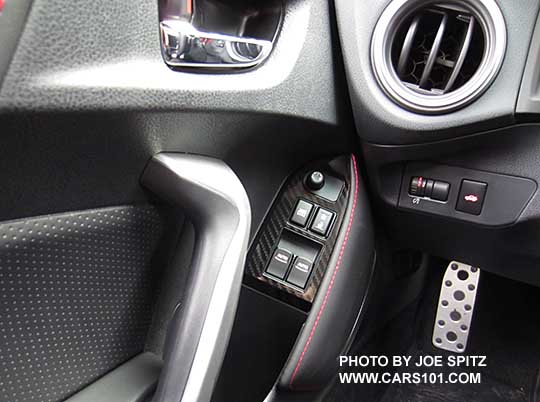 2017 Subaru BRZ Limited driver's door panel- plastic insert, silver door grip, chrome door handle, illuminated power window switches, silver vent trim