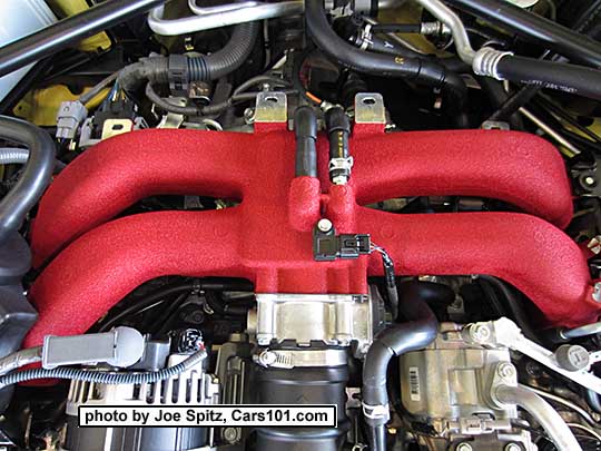 close up of the new for 2017 Subaru BRZ manual transmission model heat diffusing, red intake.