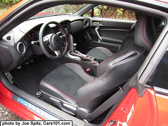 2017 Subaru BRZ Limited interior, black alcantara seating, manual transmission, Pure red car shown.