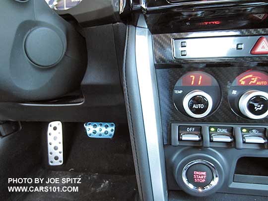 2017 BRZ Limited  has a gray, illuminated pushbutton start button and covered ignition key on the steering column