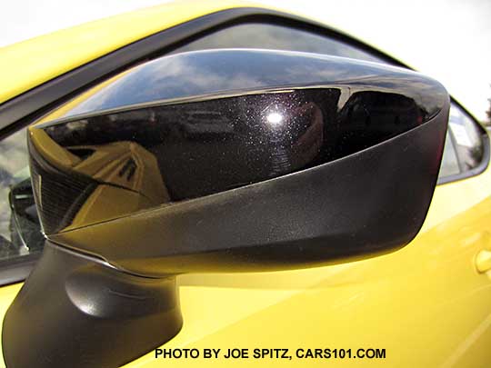 closeup of the gloss black upper and matte black lower side mirror on the 2017 Subaru BRZ Limited Series.Yellow