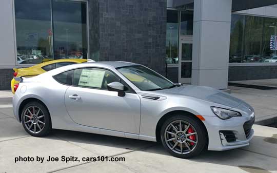 2017 ice silver Subaru BRZ Limited with optional performance pkg (notice the wheels, red brake calipers). charlesite yellow BRZ Series.Yellow in the background