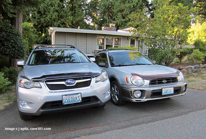 front end of a 2013 subaru xv crosstrek and 2002 impreza outback sport