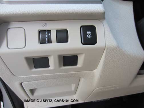 crosstrek driver controls, by left knoee, ivory interior shown
