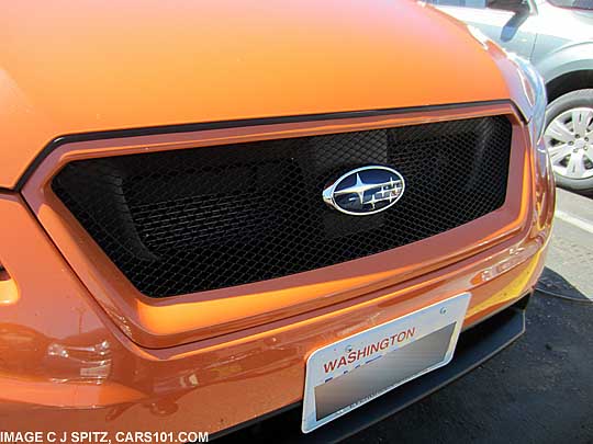 closeup of sport mesh grill, tangerine orange subaru vx crosstrek