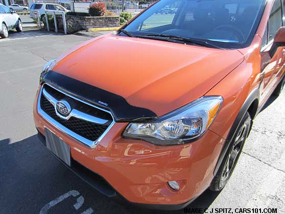 optional front hood preotector shown on tangerine orange 2013 subaru xv crosstrek