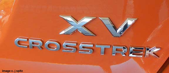 subaru xv crosstrek logo, tangerine orange shown