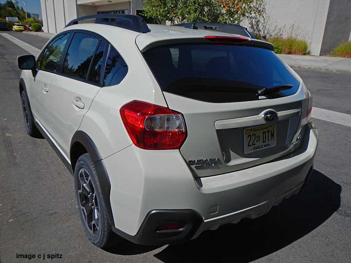 khaki color subaru crosstrek rear view