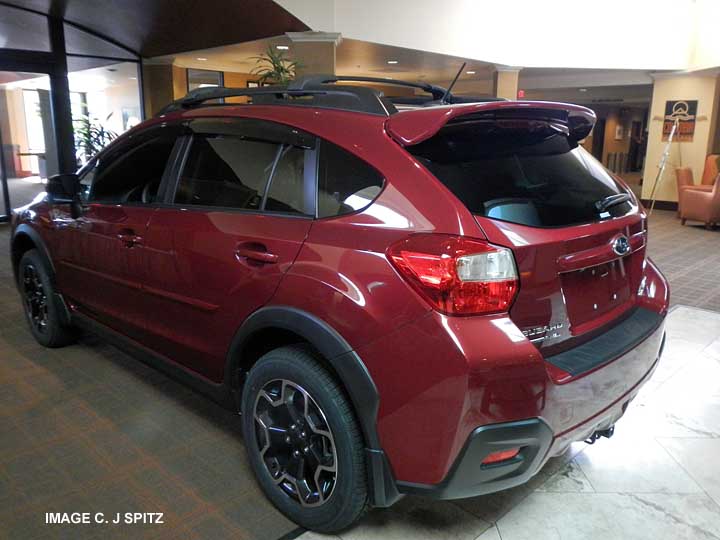 venetian red 2013 subaru xv crosstrek- optional body side moldings, rear spoiler, splash guards, rear bumper cover, crossbars, windo drip moldings