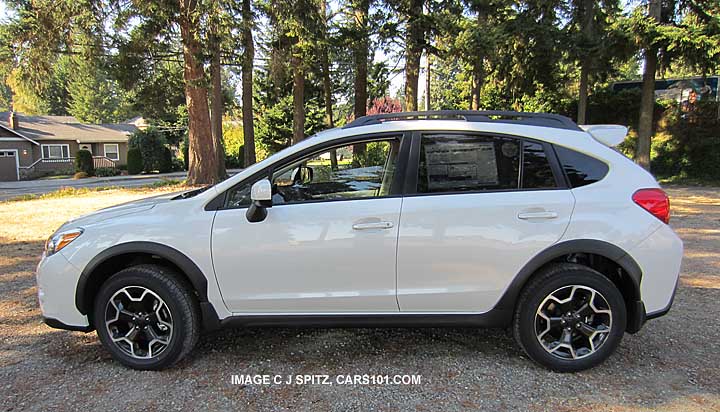 satine white pearl subaru crosstrek side view with optional rear spoiler 2013 model