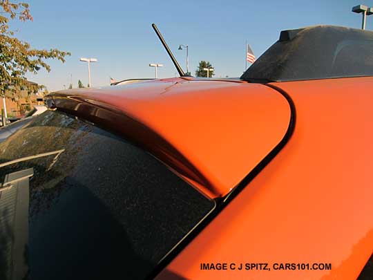 standard rear spoiler, subaru crosstrek, tangerine orange shown
