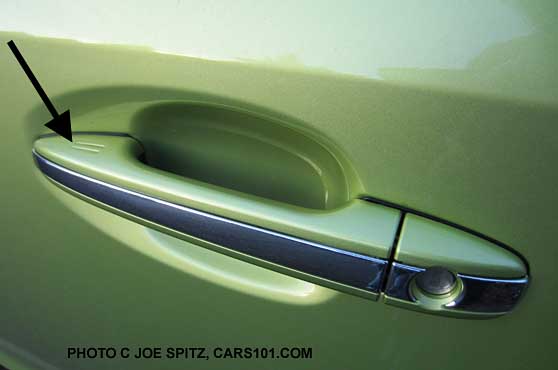 crosstrek hybrid driver side keyelss access outside door handle has a chrome strip- plasma green shown