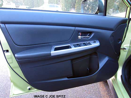 crosstrek hybrid door has silver armrest