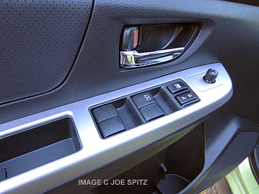 close-up of silver armrest, subaru crosstrek hybrid