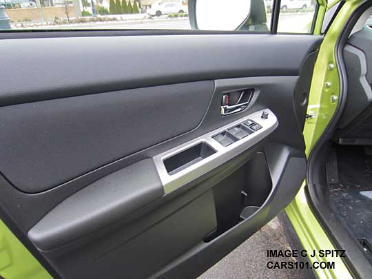 2014 Subaru Crosstrek Hybrid driver door panel with silver trim. Gray shown