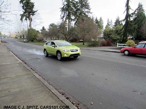 plasma green Subaru Crosstrek Hybrid on the street #1