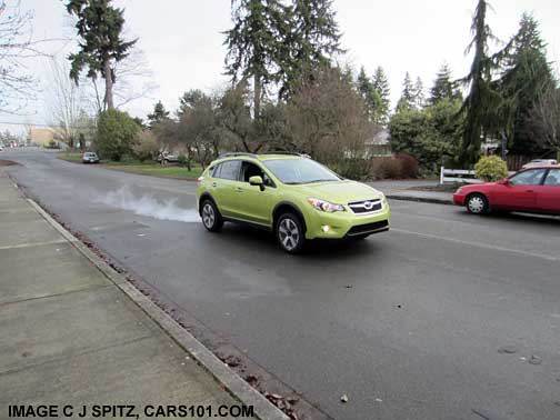 plasma green Subaru Crosstrek Hybrid on the street, #2