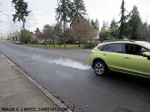 plasma green Subaru Crosstrek Hybrid on the street, #4