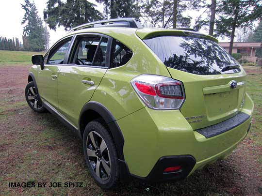 rear view plasma green Subaru Crosstrek Hybrid, with optional rear bumper cover