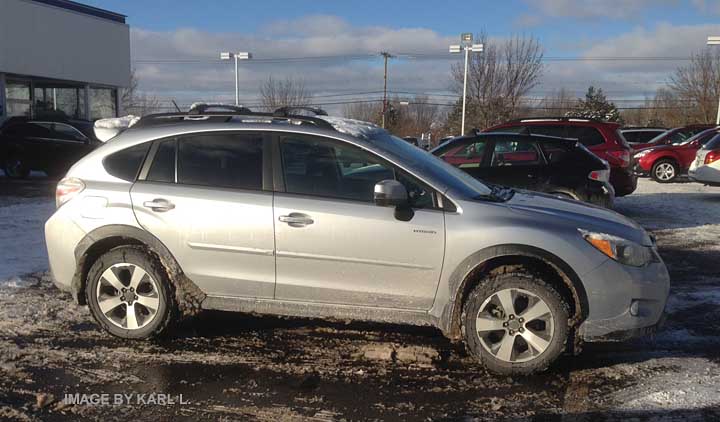 crosstrek hybrid in winter, ice silver shown