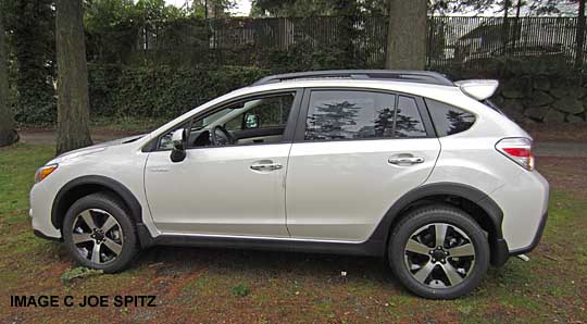 subaru crosstrek hybrid with optional rear spoiler, satin white color shown