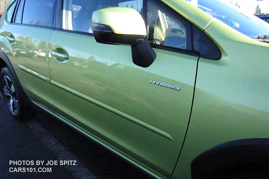 Subaru Crosstrek Hybrid with body side moldings. Plasma Green