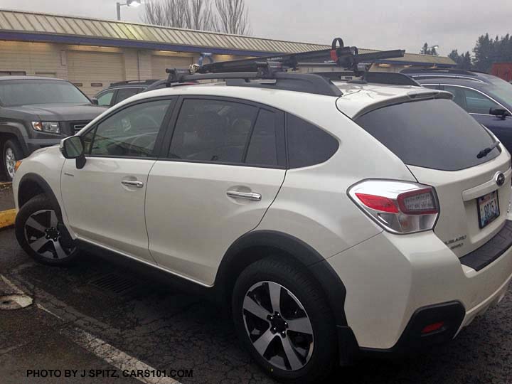 subaru crosstrek hybrid, satin white pearl, with ski attachments