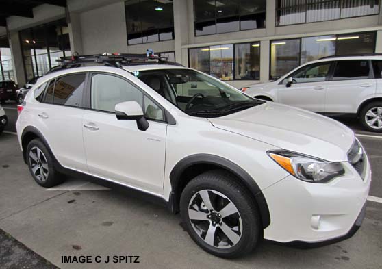 satin white crosstrek hybrid with ski attachment