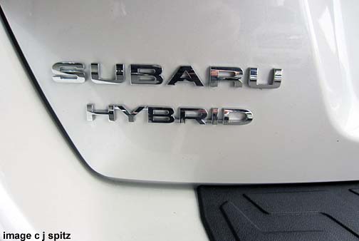 white subaru crosstrek hybrid logo