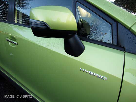 crosstrek hybrid outside mirros have integrated turn signals. plasma green color shown